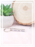 The 3D hand-stamped keyring features four sides with the heartfelt message, "I love you more, The end. I win." It is embellished with a stamped heart, where we can personalise it with an initial before the heart upon request.
