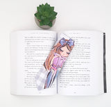 Brunette girl reading bookmark