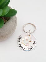 Hand stamped 'some bunny loves you' keyring