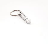 This gorgeous 3d bar keyring has 4 sides that we can customise. It reads ' Drive safe I need you here with me' Finished off with a stamped heart where we can add an initial before the heart if you would like.  A lovely little reminder to a new driver or just to the one you love.  * 40mmx5mmx5mm. *Each letter is stamped individually by hand. *Fantastic gift idea for Birthdays/Christmas and so on.